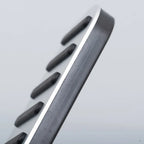 Silver metallic pedal plate with black anti-slip rubber inserts for enhanced grip.