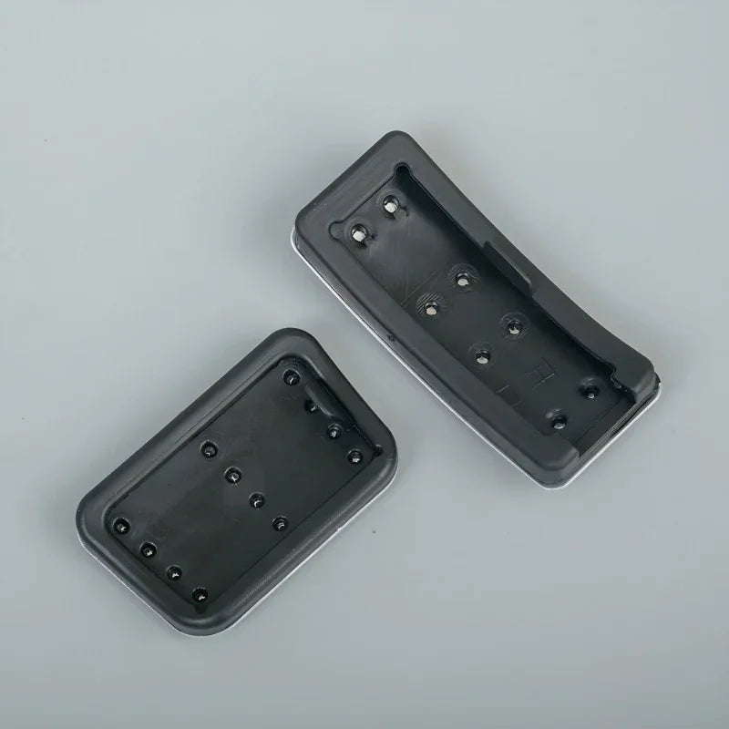 Two black durable rubber protective covers for BYD vehicle components.