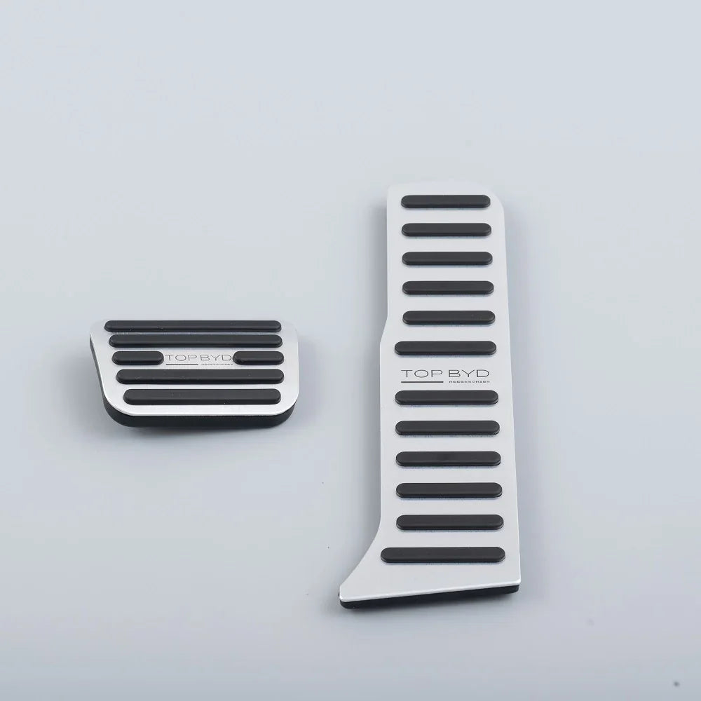 Silver aluminum pedal covers with black non-slip rubber grips for BYD accessories.