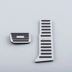 Silver aluminum pedal covers with black non-slip rubber grips for BYD accessories.