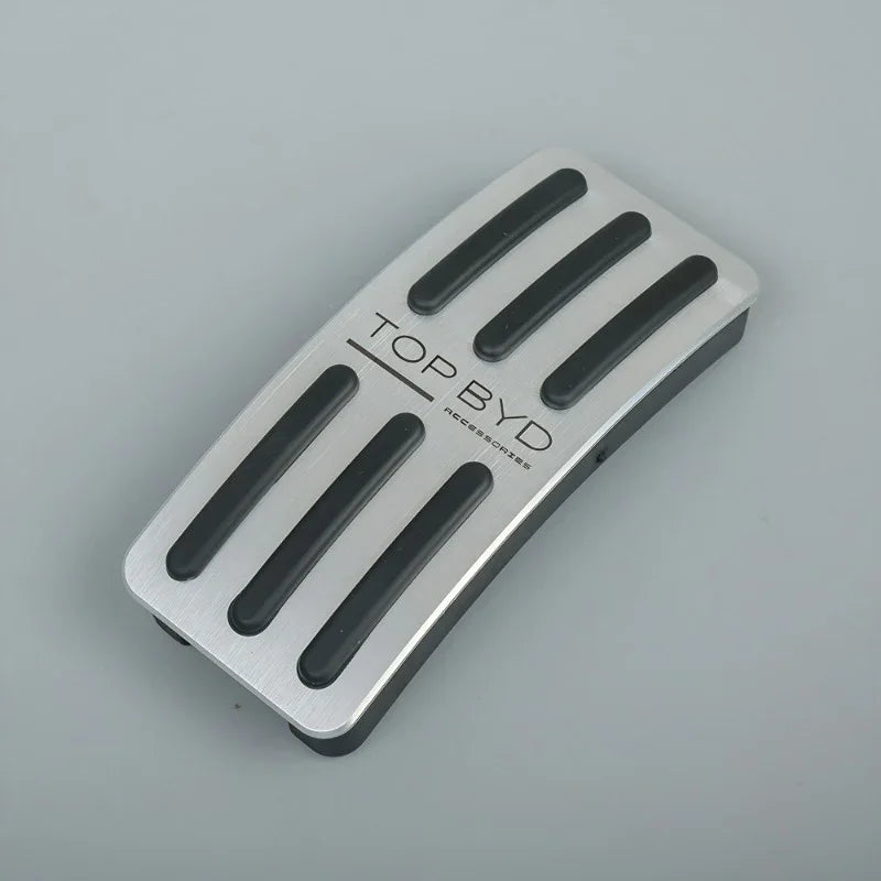 Silver aluminum alloy car pedal with black anti-slip rubber strips and TOP BYD logo.