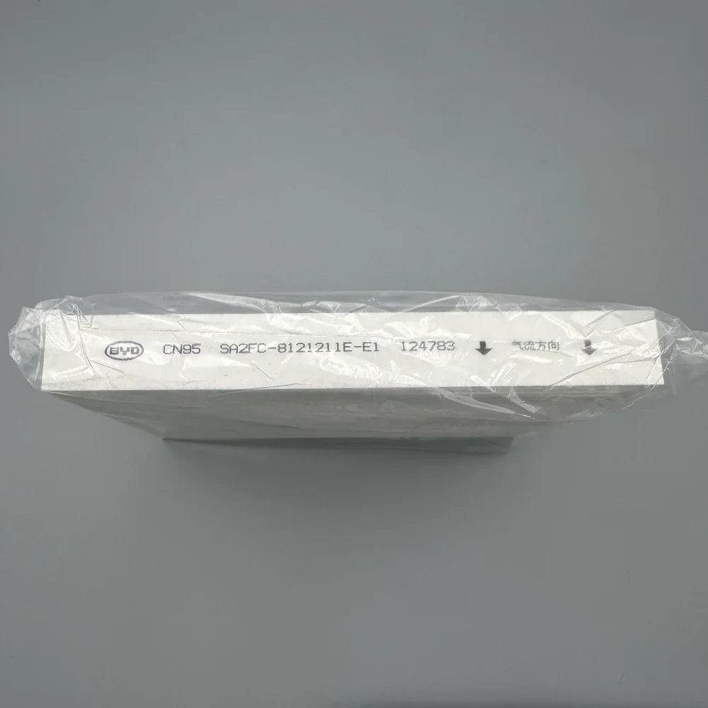 White BYD CN95 cabin air filter in protective plastic packaging.