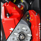 Red high-performance brake caliper with durable metal construction for enhanced car protection.