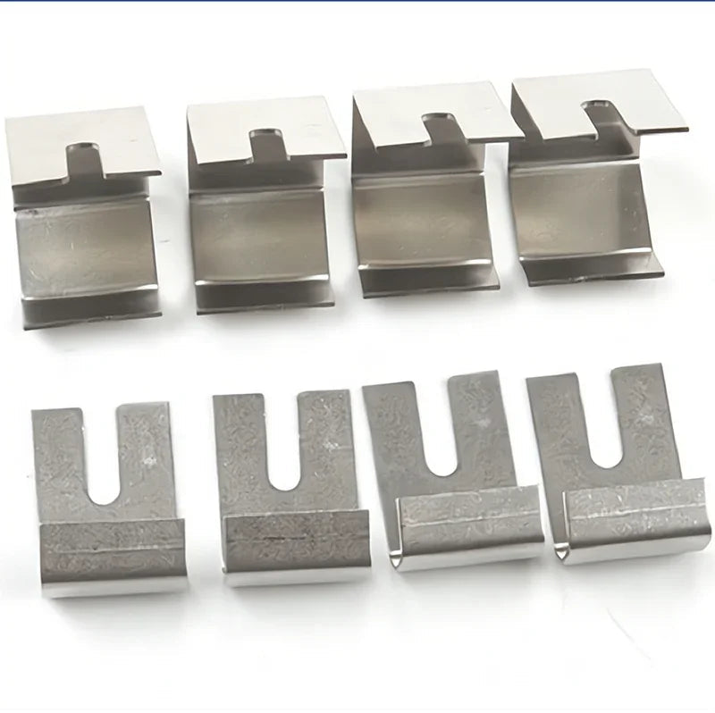 Set of eight silver stainless steel metal clips for car accessory installation.