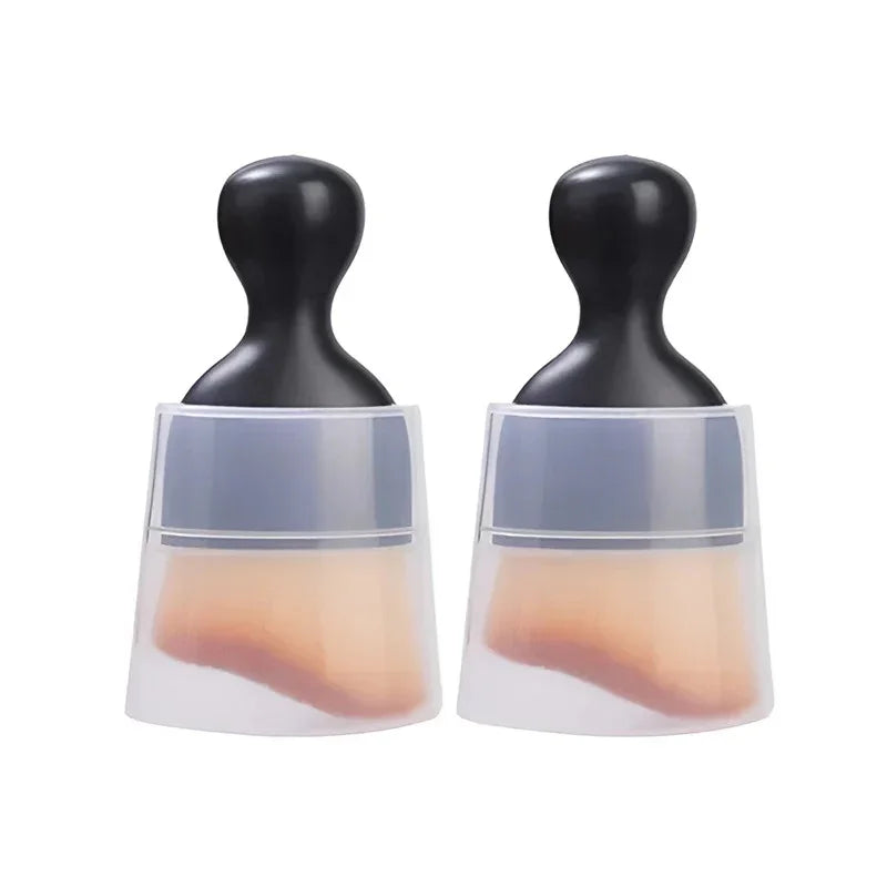 Pair of black ergonomic handle silicone cleaning brushes with translucent frosted bodies.