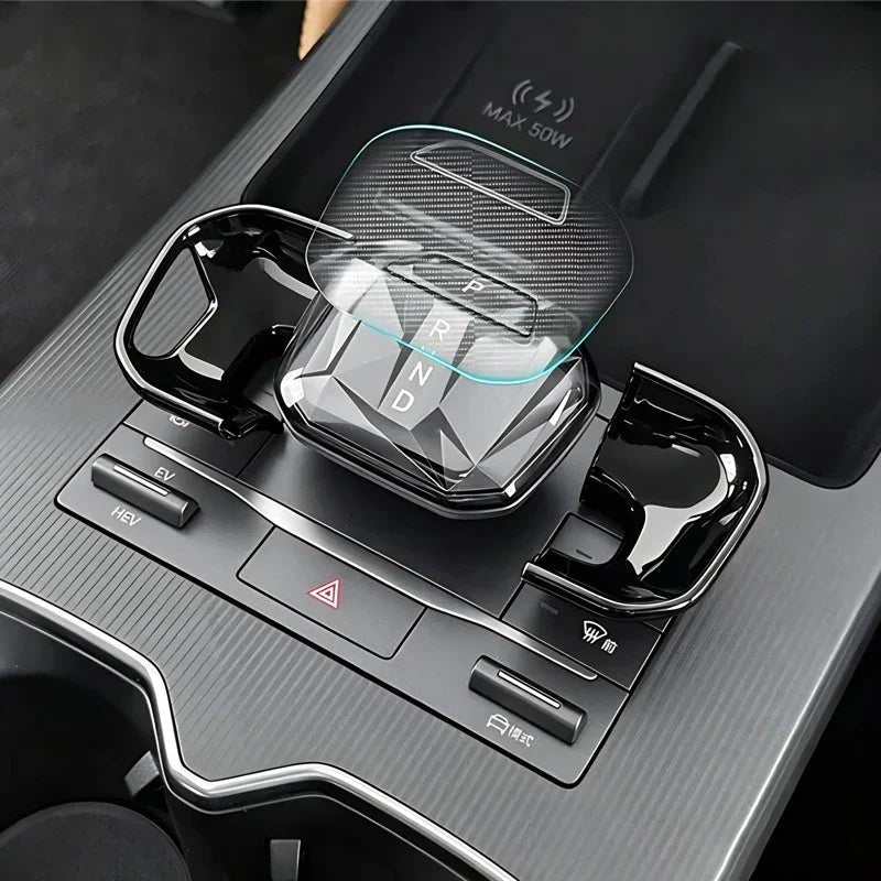 Clear tempered glass gear shifter protector for BYD center console in glossy black finish.