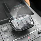Clear tempered glass protector for car gear shifter with a crystalline surface design.