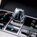 Crystal clear transparent gear shifter knob with illuminated RND gear indicator for BYD interior.