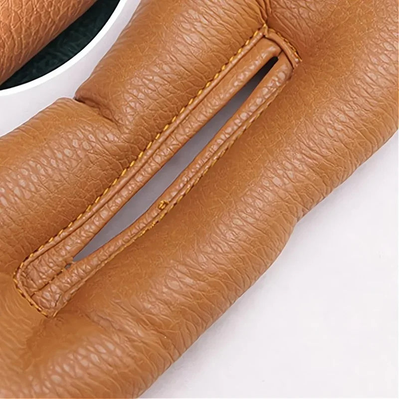 Tan textured leather car floor mat with precise stitching and protective design.