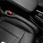 Black premium PU leather seat gap filler protecting the car interior from spills and debris.