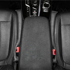 Premium black textured faux leather center console armrest cover for car interior protection.