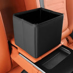 Professional black leather car trash bin with stitching, placed on orange leather car seat.