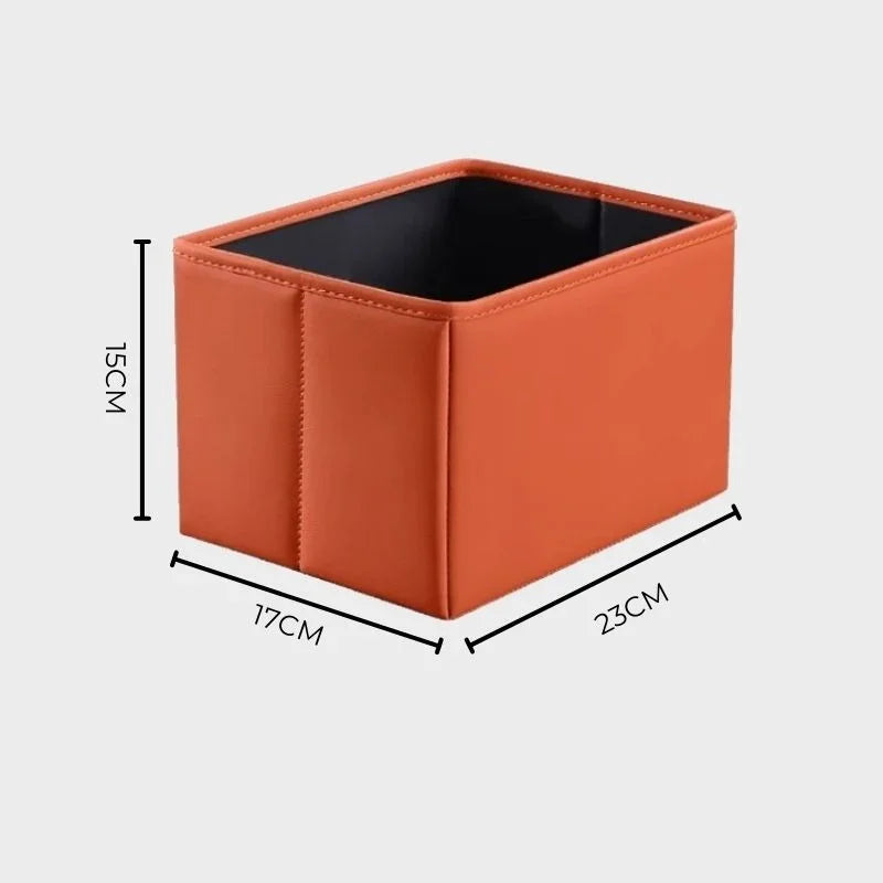 Orange faux leather car organizer box with dimensions 23cm x 17cm x 15cm.
