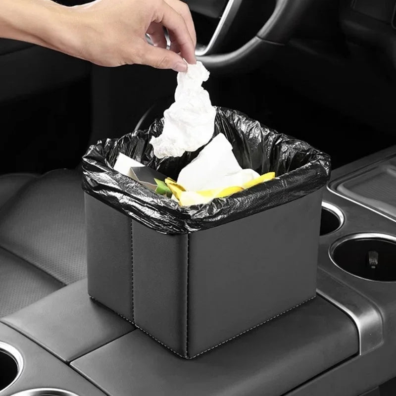 Professional black leather car trash bin with liner for vehicle interior organization.
