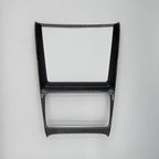 Black carbon fiber texture center console trim frame for BYD interior enhancement.
