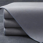 Premium grey microfiber car floor mats with reinforced edge stitching for durable protection.