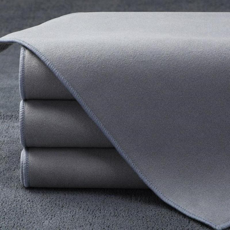 Premium grey microfiber car floor mats with reinforced edge stitching for durable protection.