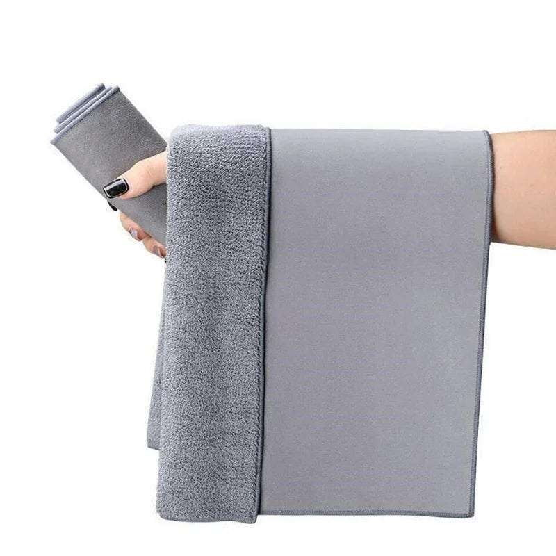 Soft grey microfiber car cleaning towel with plush absorbent texture.