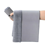 Soft grey microfiber car cleaning towel with plush absorbent texture.
