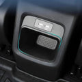 Black interior car storage compartment featuring dual USB charging ports and blue LED accent lighting.
