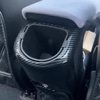 Carbon fiber center console cup holder trim in gloss black for BYD interior.