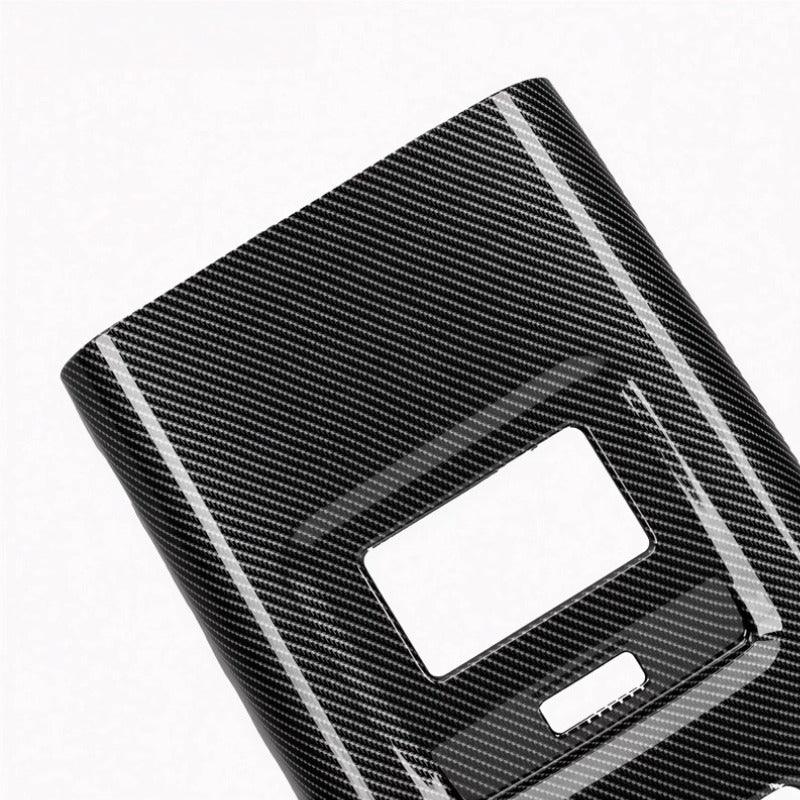 Professional carbon fiber texture interior trim panel in glossy black finish.