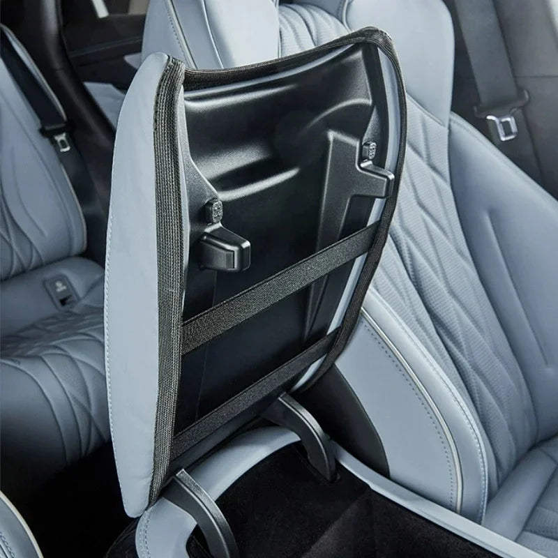 Grey high-quality fabric back seat protector for BYD car interior with black storage pockets.