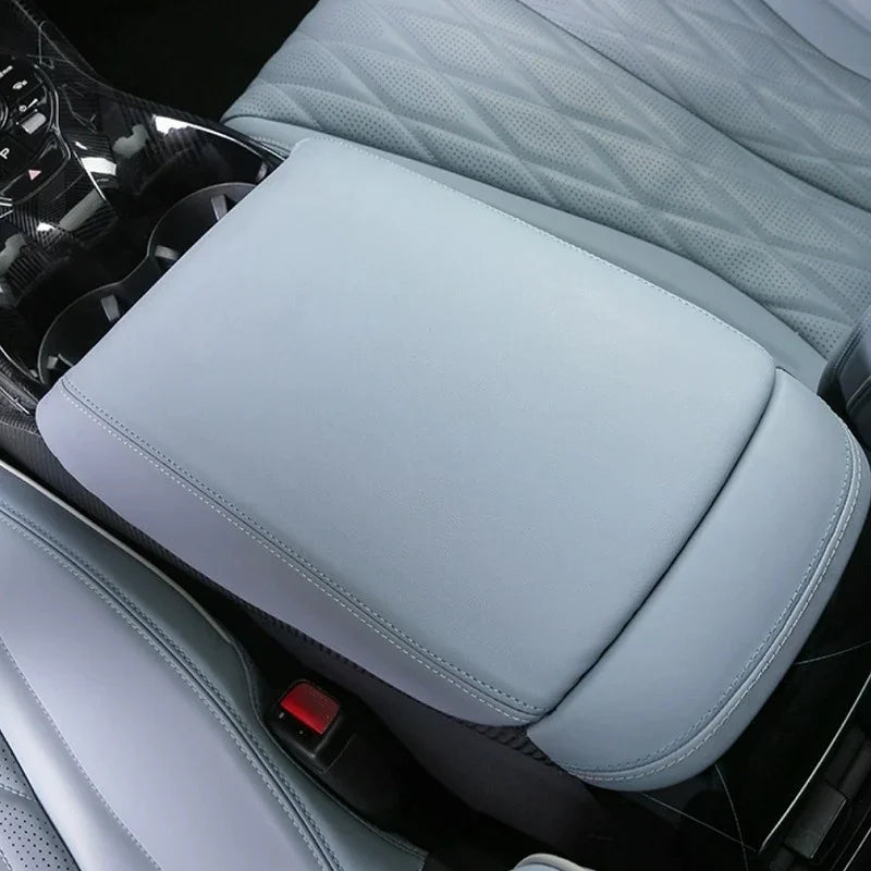 Light grey premium leather center console armrest cover with precise stitching for BYD interior.
