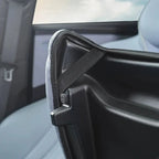 Close-up of a black durable fabric car seat back protector with reinforced stitching.