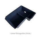 Black flocked center storage box for car interior organization.