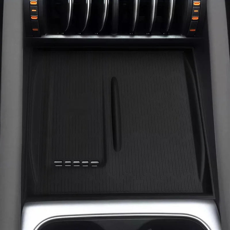 Black textured TPE center console tray for BYD, providing custom-fit protection.