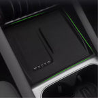 Black textured premium center console organizer tray with integrated green ambient LED lighting.