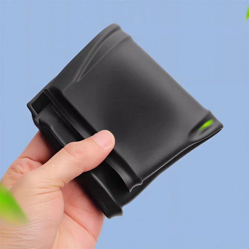 Flexible black matte silicone cup holder expander for BYD vehicle interior protection.