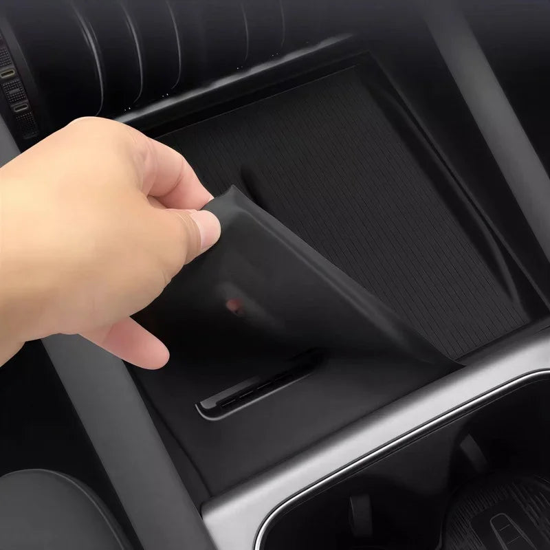 Black textured silicone center console tray liner for BYD car interior protection.