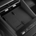 Black interior center console with a wireless charging pad marked MAX 50W.
