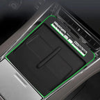 Black rubberized center console tray protector for BYD vehicles, providing a custom fit.