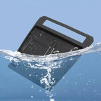 Waterproof black matte car floor mat partially submerged in water to show liquid resistance.