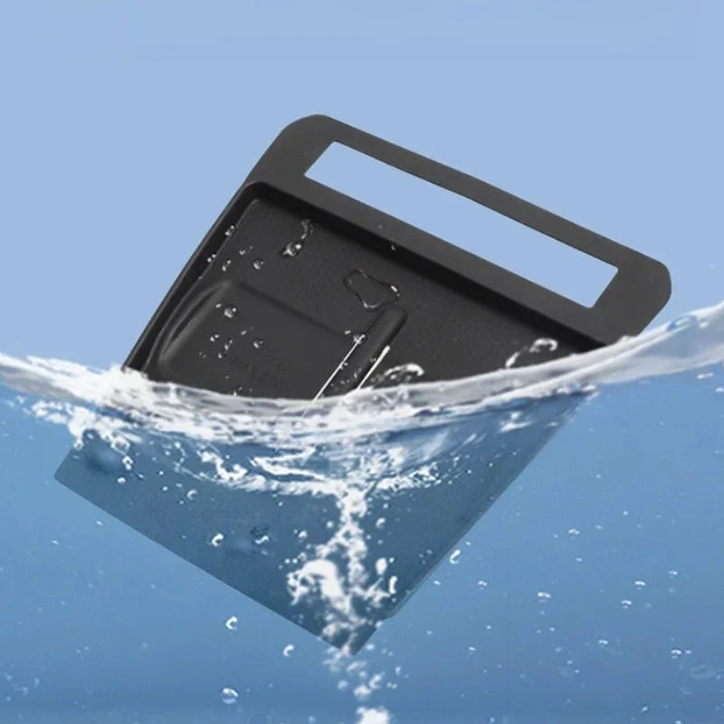 Waterproof black matte car floor mat partially submerged in water to show liquid resistance.