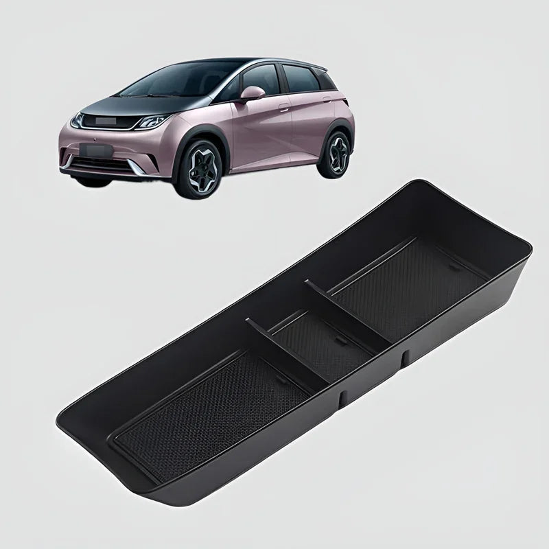 Black textured non-slip center console organizer tray for BYD electric car interior.