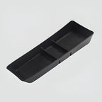 Black durable matte organizer tray with textured anti-slip compartments for car storage.