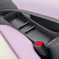 Black carbon fiber texture center console organizer tray for BYD interior storage.