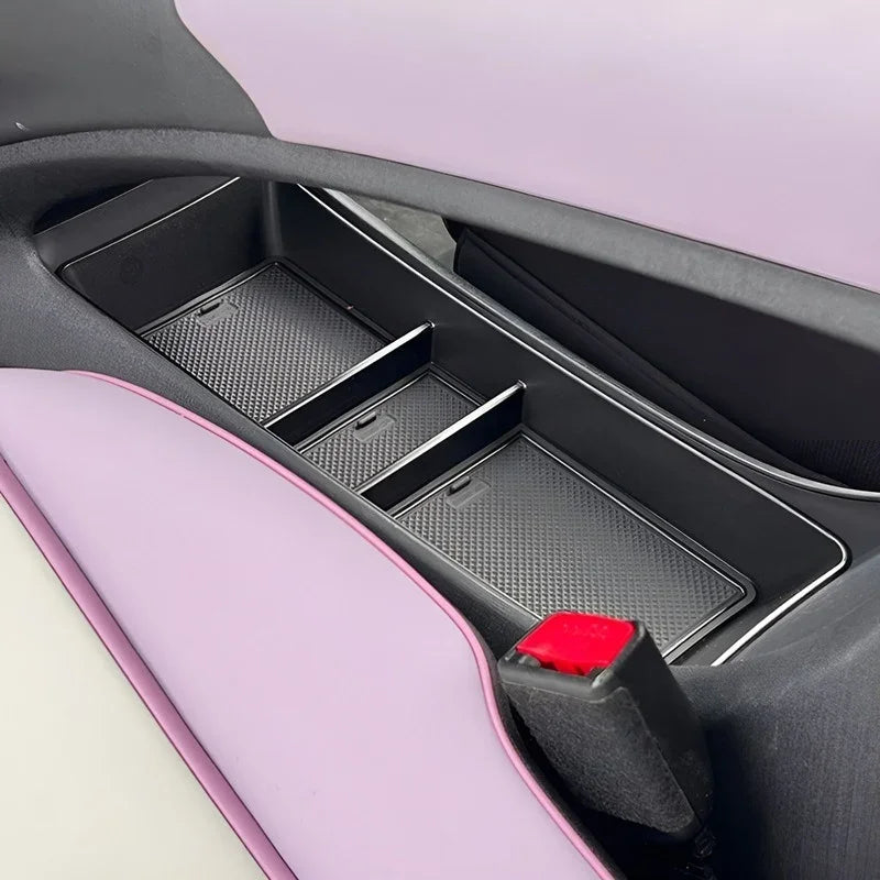 Black carbon fiber texture center console organizer tray for BYD interior storage.
