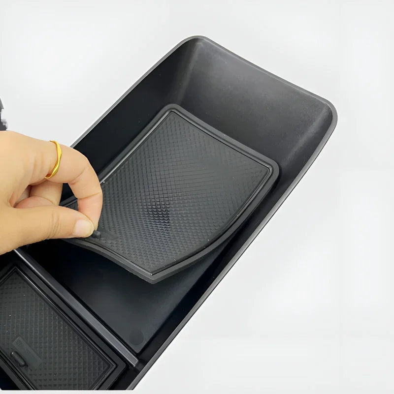 Black textured TPE center console organizer tray for BYD vehicle interior protection.