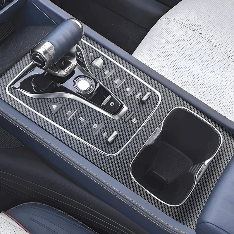 Carbon fiber texture console mat in blue for BYD, protecting the center console and cup holder.