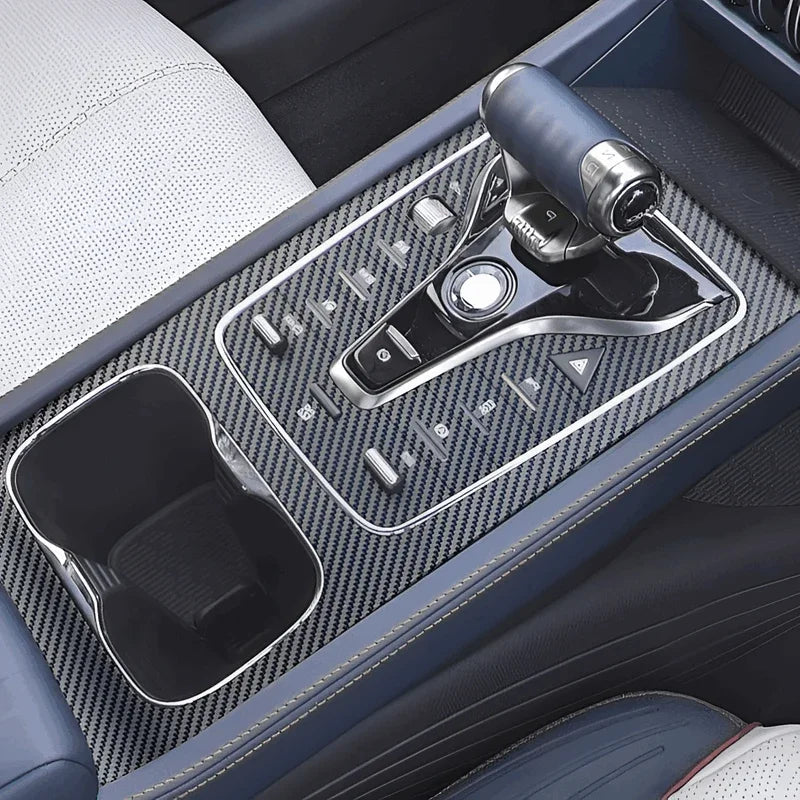 Carbon fiber center console cover in grey for BYD, featuring a professional textured finish.