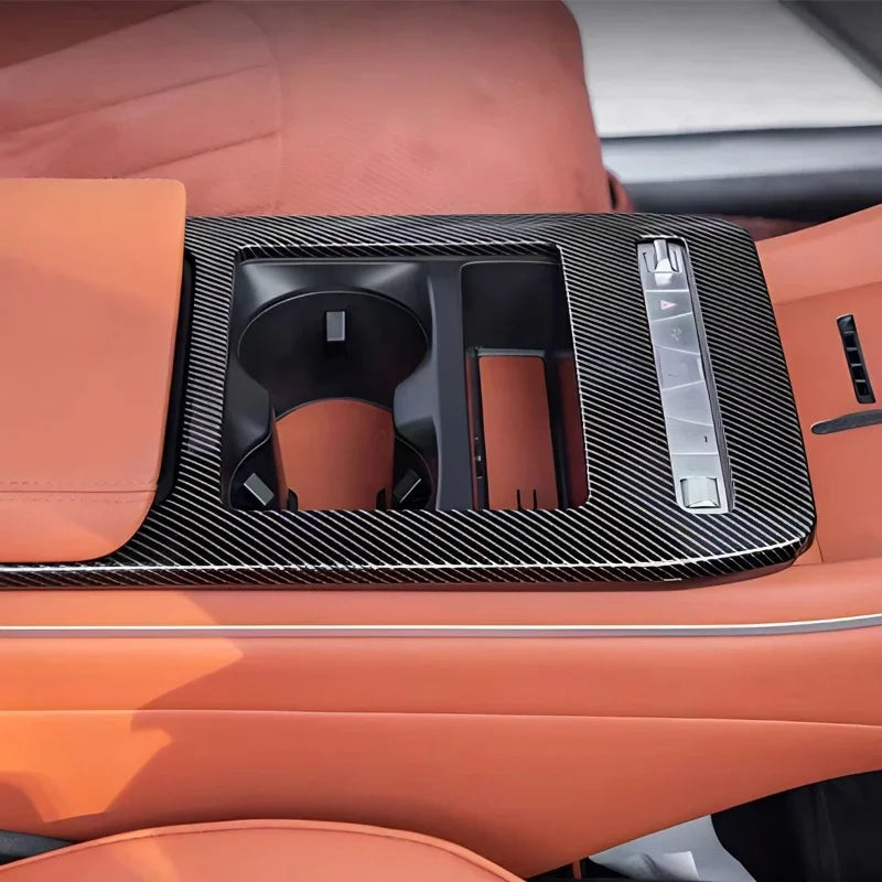 Black carbon fiber texture center console trim for BYD interior protection.