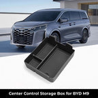 Black matte textured center console storage tray for BYD M9 car interior organization.