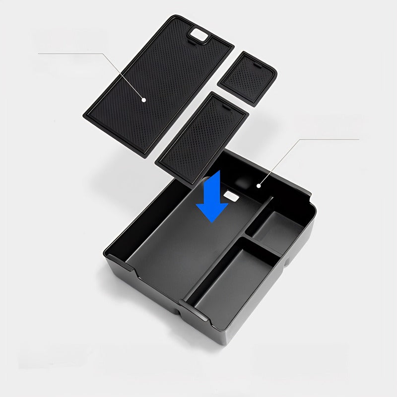 Black carbon fiber texture center console organizer tray for BYD vehicle interior.