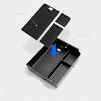 Black carbon fiber texture center console organizer tray for BYD vehicle interior.