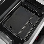 Black textured TPE trunk organizer tray for custom-fit car cargo protection.
